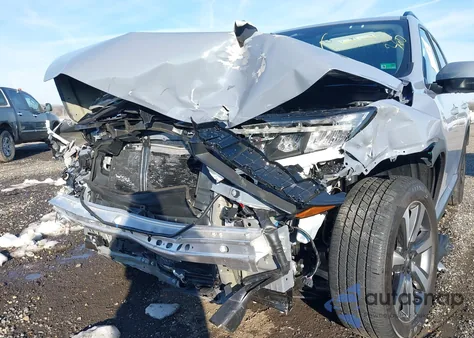 2025 Honda Pilot Touring z USA, uszkodzony, nr VIN 5FNYG1H72SB131781